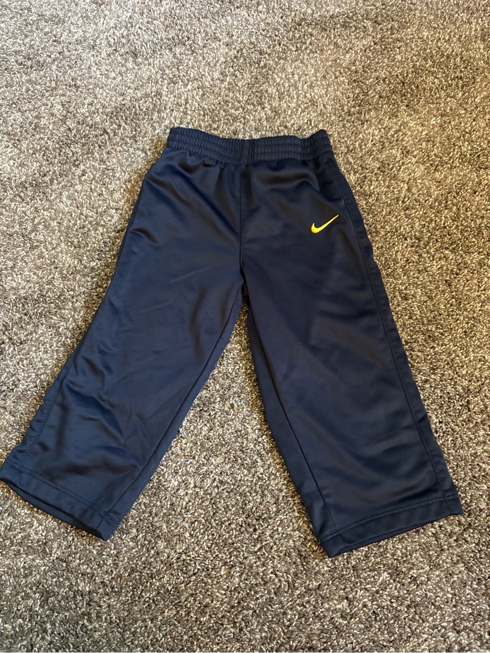Nike Kids Navy Sweatpants with Yellow Swoosh